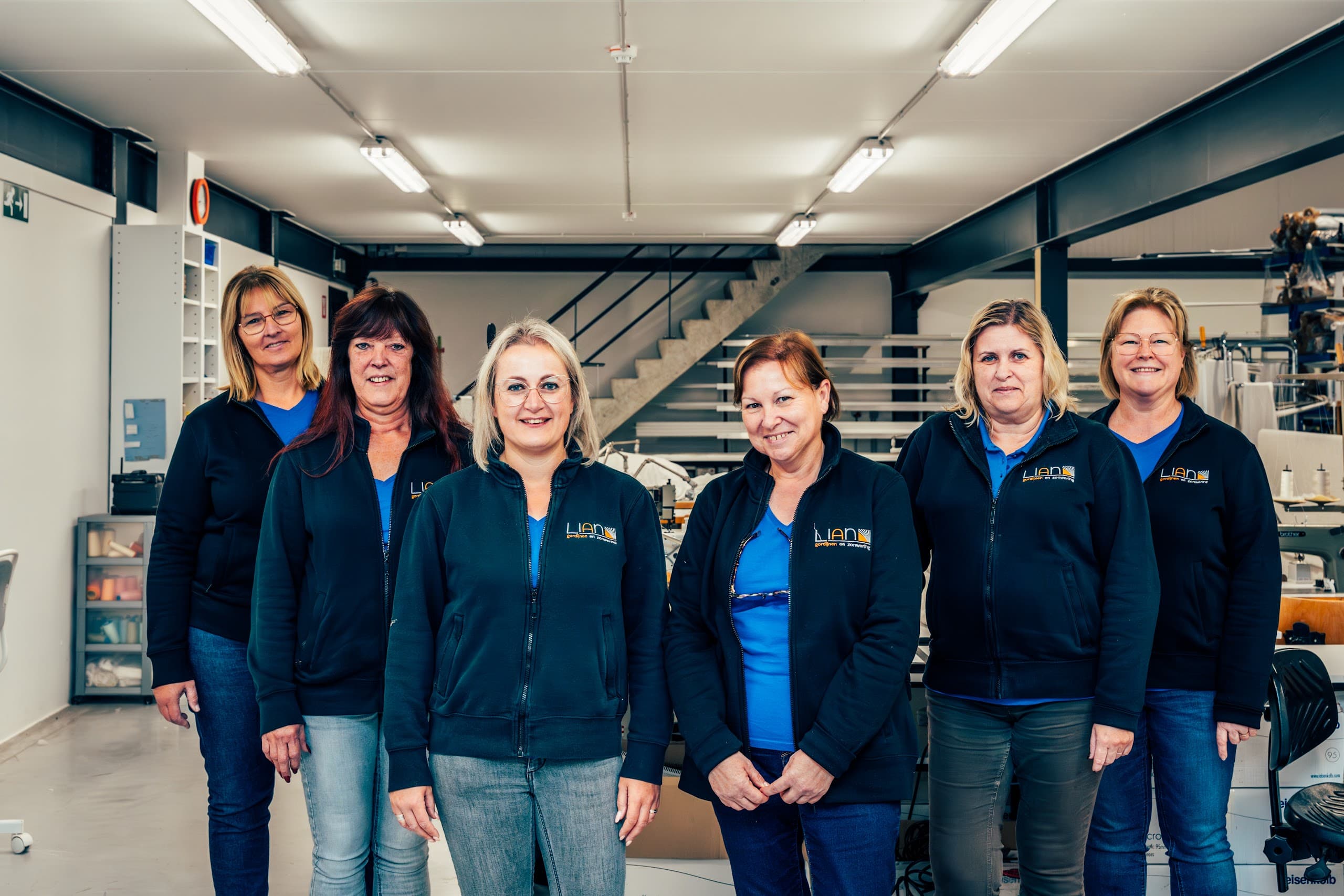 Het team van Lian in het eigen atelier.